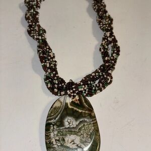 Source‎ Unknown Green and Brown Pendant Necklace